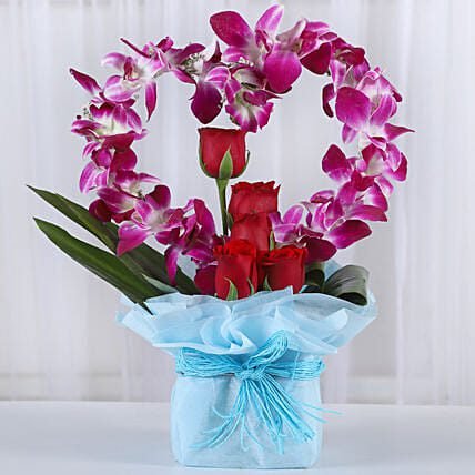 Romantic Heart Shaped Orchids Arrangement